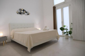 Elegante Bilocale con Giardino